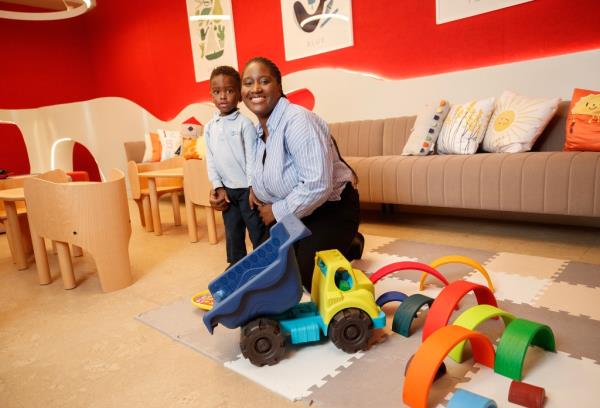 Jeanne Ngang and her toddler son will have plenty of time to play together in a fun One Wall Street playroom.