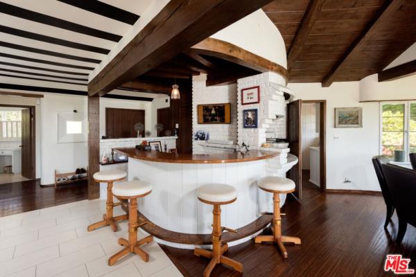 The circular bar area that anchors the home.