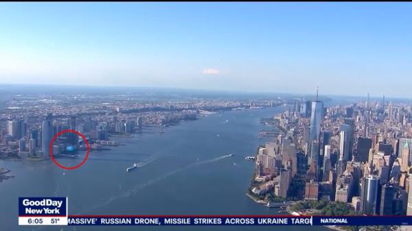 The little dot then quickly crosses the tree line, and enters the airspace of the Hudson River, moving away from New Jersey, banking along the lower Manhattan shoreline.